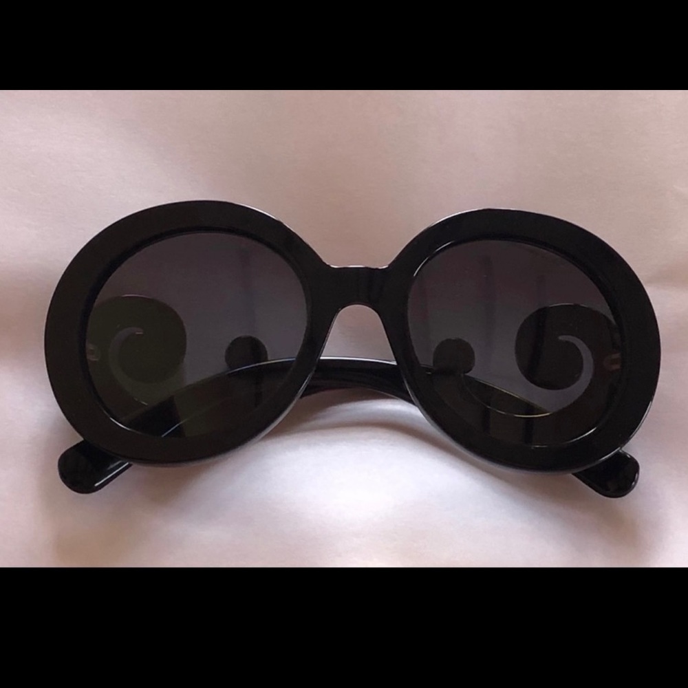 Prada sunglasses.